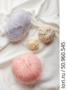 Balls of wool and mohair for knitting in pastel colors. Стоковое фото, фотограф Ирина Буракова / Фотобанк Лори