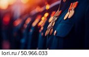 Military Appreciation: Close-up of uniformed personnel with medals, honoring service and commitment, possibly for a memorial event or recognition ceremony. Стоковое AI-изображение, AI-художник Данила Большаков / Фотобанк Лори
