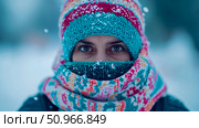 Cozy Winter Adventure: A Warmly Clad Person's Gaze in a Snowy Environment, Concept for Seasonal Apparel or Holiday Greeting. Стоковое AI-изображение, AI-художник Данила Большаков / Фотобанк Лори