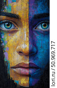 Vibrant Split Face Portrait showcasing a striking duality of warm yellow and cool blue tones with expressive impasto textures and mesmerizing eyes. Стоковое AI-изображение, AI-художник Данила Большаков / Фотобанк Лори