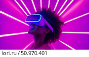 Futuristic VR Immersion: A Woman Experiencing Virtual Reality Amidst Vibrant Magenta and Blue Neon Light Beams. Стоковое AI-изображение, AI-художник Данила Большаков / Фотобанк Лори
