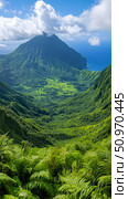 Expansive tropical landscape revealing a deep, verdant valley filled with ancient ferns, culminating in a towering volcanic peak meeting the vast blue ocean under a partly cloudy sky. Стоковое AI-изображение, AI-художник Данила Большаков / Фотобанк Лори