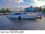 St. Petersburg, Russia, August 28-2024.A beautiful white yacht is anchored at a pier near the city limits. Стоковое фото, фотограф lyudmila Soloveva / Фотобанк Лори