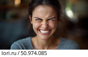 Close-up Portrait of a Woman Showing Intense Emotion. Стоковое AI-изображение, AI-художник Данила Большаков / Фотобанк Лори