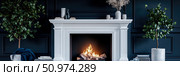 Elegant White Fireplace Mantel in a Dark Room with Plants and Decor. Стоковое AI-изображение, AI-художник Данила Большаков / Фотобанк Лори