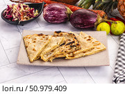 Indian stuffed potato bread Paratha. Стоковое фото, фотограф Андрей Старостин / Фотобанк Лори