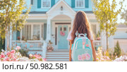 Girl with backpack walking towards a light blue house on a sunny day. Стоковое AI-изображение, AI-художник Данила Большаков / Фотобанк Лори