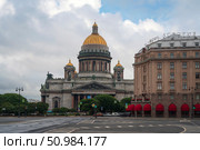 Saint Petersburg, Russia, July 20, 2024: St. Isaac's Cathedral, Astoria Hotel and St. Isaac's Square on a sunny summer day. Редакционное фото, фотограф Ula Ulachka / Фотобанк Лори