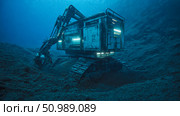 A deep sea mining vehicle operates on the ocean floor. Стоковое AI-изображение, AI-художник Евгения Пархоменко / Фотобанк Лори