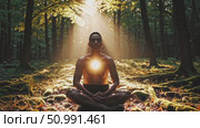 Muscular male practicing meditation in woodland setting, sunlight streaming across bare torso, embodying spiritual harmony and natural serenity. Стоковое AI-видео, аниматор Данил Руденко / Фотобанк Лори