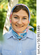Close up portrait of a middle-aged woman in a headscarf. Стоковое фото, фотограф Андрей Аркуша / Фотобанк Лори