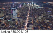 Glowing Manhattan skyline bathing in nocturnal light, revealing skyscraper silhouettes, streaming car lights, and Hudson River stretching beneath urban landscape. Стоковое AI-видео, аниматор Данил Руденко / Фотобанк Лори