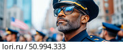 Officer in Uniform Reflecting at a City Event. Стоковое AI-изображение, AI-художник Данила Большаков / Фотобанк Лори