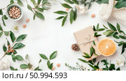 Elegant Flatlay: Gift, Flowers, and Citrus Fruit on White. Стоковое AI-изображение, AI-художник Данила Большаков / Фотобанк Лори