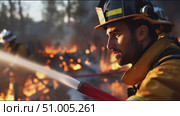 Firefighters battle intense flames in a dramatic rescue operation during a wildfire in a mountainous area in the afternoon. Стоковое AI-видео, аниматор Сергей Толмачёв / Фотобанк Лори
