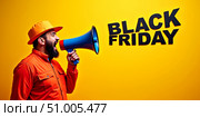 'Black Friday' shoutout: a colorful man with megaphone brings the announcement to life. Стоковое AI-изображение, AI-художник Сергей Бирюков / Фотобанк Лори