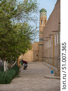 Old houses in Itchan Kala in Khiva (2022 год). Стоковое фото, фотограф Юлия Белоусова / Фотобанк Лори