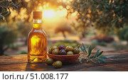 A bottle of olive oil sits beside a bowl of olives under a beautiful sunset, highlighting nature's bounty and rich flavors in a tranquil setting. Стоковое AI-видео, аниматор Данила Большаков / Фотобанк Лори