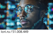 A man deeply concentrates amidst a backdrop of colorful screens, embodying the essence of innovation in a high-tech setting. Стоковое AI-видео, аниматор Данила Большаков / Фотобанк Лори