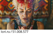 A woman engages in meditation, enveloped in smoke, in a vibrant setting that reflects her deep spiritual exploration and connection to energy. Стоковое AI-видео, аниматор Данила Большаков / Фотобанк Лори