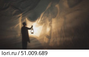Shadow play in the cave with lantern light creates captivating silhouettes at dusk. Стоковое AI-видео, аниматор Сергей Толмачёв / Фотобанк Лори