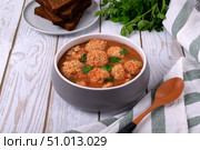 Soup with haddock fish balls in a gray bowl on white table. Стоковое фото, фотограф Оксана Чаюн / Фотобанк Лори