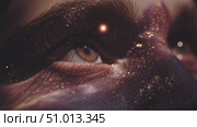 Cosmic beauty revealed through the soulful gaze reflecting the universe's grandeur at night. Стоковое AI-видео, аниматор Сергей Толмачёв / Фотобанк Лори