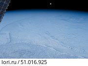 View from space of a full Moon rising over a frigid Hudson Bay in northern Canada. Стоковое фото, фотограф Stocktrek Images, Inc. / ТАСС / Фотобанк Лори