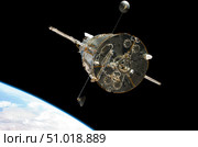 The Hubble Space Telescope in orbit above Earth. Стоковое фото, фотограф Stocktrek Images, Inc. / ТАСС / Фотобанк Лори