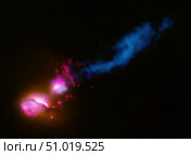 A powerful jet from a supermassive black hole is blasting a nearby galaxy. Стоковое фото, фотограф Stocktrek Images, Inc. / ТАСС / Фотобанк Лори