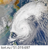 Satellite image of a typhoon. Стоковое фото, фотограф Stocktrek Images, Inc. / ТАСС / Фотобанк Лори