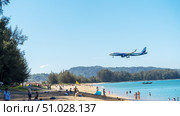 Phuket, Thailand, February 25, 2024: The plane lands at Phuket airport. Редакционное фото, фотограф Igor Skripachev / Фотобанк Лори