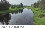 Beautiful quiet river in the countryside in summer. Стоковое видео, видеограф Виктор Тихонов / Фотобанк Лори