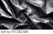 Wrinkled black paper texture creating depth and visual interest. Стоковое AI-изображение, AI-художник Katsiaryna Repich / Фотобанк Лори