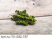 Green pepper corn on the branch. Стоковое фото, фотограф Андрей Старостин / Фотобанк Лори