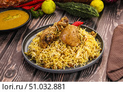 Indian chicken biryani with basmati rice. Стоковое фото, фотограф Андрей Старостин / Фотобанк Лори