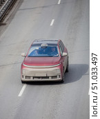 Front above view of a red Li L7 SUV driving on highway. Редакционное фото, фотограф Константин Григорьев / Фотобанк Лори
