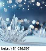 Magical winter background with ice crystals in snow, abstract christmas holiday scene with sharp icicles and bokeh lights for new year celebration. Стоковое AI-изображение, AI-художник Павел Муравьев / Фотобанк Лори