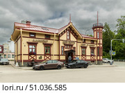Sortavala, Karelia, Russia - 8 July, 2023: View of the wooden building in the Empire style Berg House. Редакционное фото, фотограф Ольга Сейфутдинова / Фотобанк Лори