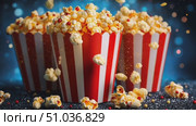 Enjoy a delightful movie night with freshly popped popcorn in vibrant striped containers, creating a perfect snack atmosphere. Стоковое AI-видео, аниматор Данила Большаков / Фотобанк Лори