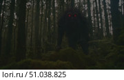 Strange monster-like creature lumbering through a dense forest, its eerie presence captured on film. Стоковое AI-видео, аниматор Данила Большаков / Фотобанк Лори