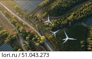Wind turbines and solar panels working together in a sustainable energy landscape. Стоковое AI-видео, аниматор Сергей Толмачёв / Фотобанк Лори