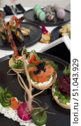 Grilled salmon steak with crispy skin sauteed vegetables and lemon served in outdoor restaurant in summer light A wooden table with a variety of dishes containing seafood, vegetables and fruit.Hand holding a spoon ready to eat pineapple fried rice with shrimp, served in a pineapple bowl, surrounded by fresh fruits and tea on a cozy table setting.Party Sea Food platter with salmon and prawns, low angle view, close-up Sea food party platter, extreme Whole poached salmon with cucumber slices for scales, high end party platter, overhead view Tiger prawns on the grill Macarooni cookies floating on blue background, levitation, macarooni cookies, dessert, sweets, colorful, delicious Two Glasses of Pink Champagne with Macarons and Oranges Elegant seaside celebration with seafood, pink floral decor, and sparkling wine overlooking the ocean. Стоковое видео, видеограф Zita Khasanova / Фотобанк Лори