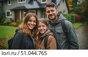 Happy man and two women are standing in front of a house, possibly discussing or posing for a photo. Стоковое AI-видео, аниматор Данила Большаков / Фотобанк Лори