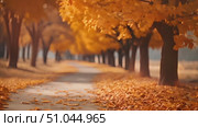 Walk along a path flanked by trees bearing vivid yellow leaves in autumn, creating a stunning visual of seasonal change. Стоковое AI-видео, аниматор Данила Большаков / Фотобанк Лори