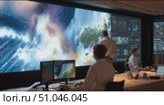 Team collaborates in modern workspace to analyze data and visualize environments in a high-tech setting. Стоковое AI-видео, аниматор Сергей Толмачёв / Фотобанк Лори
