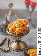 Muslim holiday sweets Moroccan chebakia chak chak and handmade nath Homemade Muslim sweet baked goods. Стоковое фото, фотограф Оксана Медведева / Фотобанк Лори