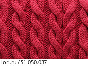Red sweater texture background, cable knit pattern, intricate textures. For design projects, product presentation. Soft Knitted Woolen Detailed Pattern. Natural Fabric Knitwear, Warm Cashmere Surface. Стоковое AI-изображение, AI-художник Марина Демидюк / Фотобанк Лори