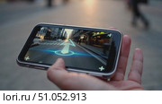 Augmented Reality Navigation: A Closer Look at How Smartphone Displays Guide Users Through City Streets with Enhanced Directional Indicators. Стоковое AI-видео, аниматор Владимир Федоров / Фотобанк Лори