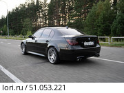 KRASNOYARSK, RUSSIA - July 31, 2025: Black BMW M5 E60. Редакционное фото, фотограф Плотников Дмитрий / Фотобанк Лори